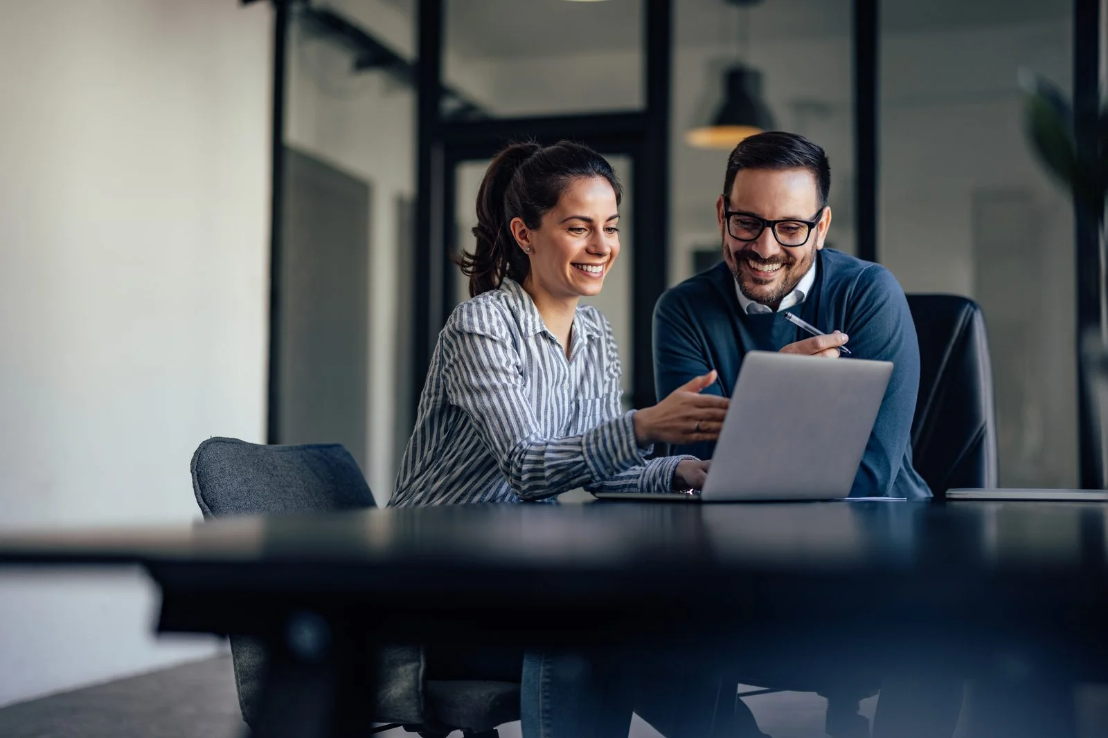 Two network entrepreneurs at work in their agency